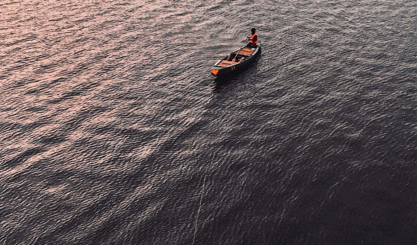 Kayak anchored in the middle of the ocean