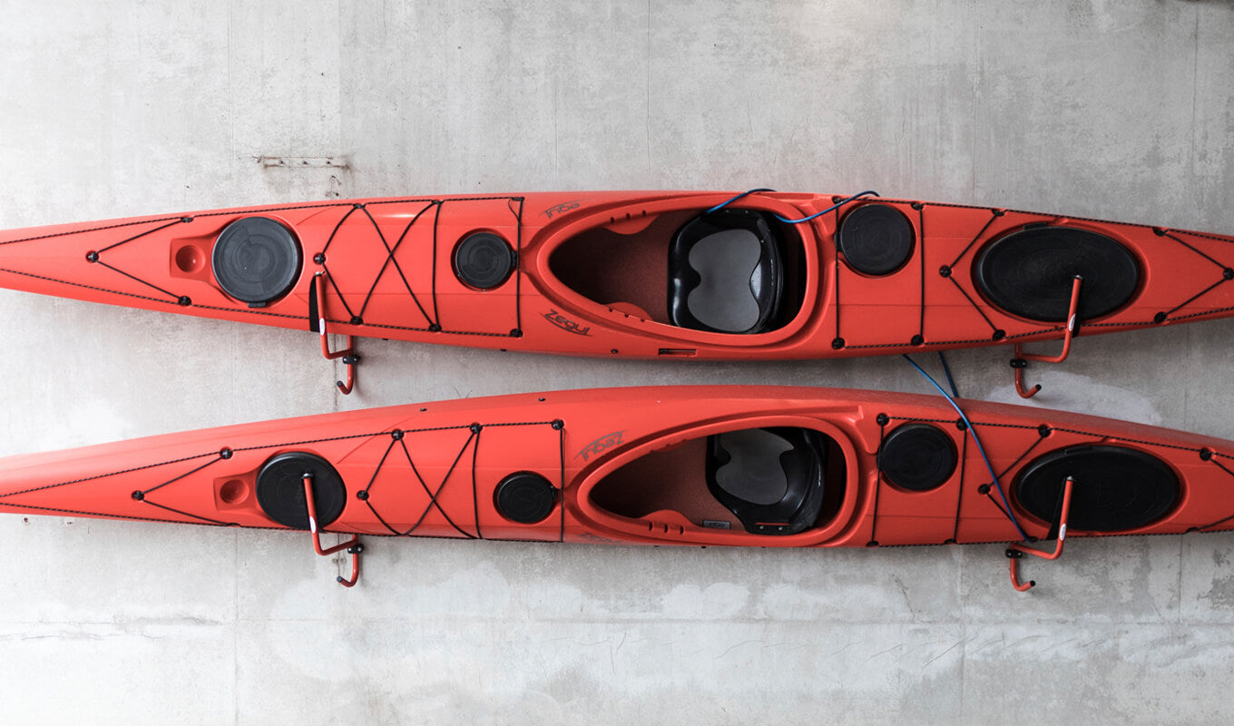 Kayak stored on wall rack